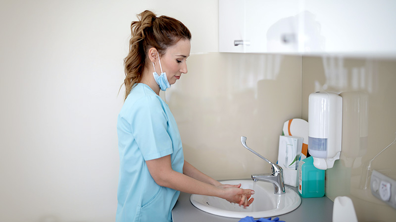 Kruger-Products-Gives-Back-to-Frontline-Workers-with-Cashmere-Collection-Rolling-It-Forward-Initiatives Nurse washing her hands