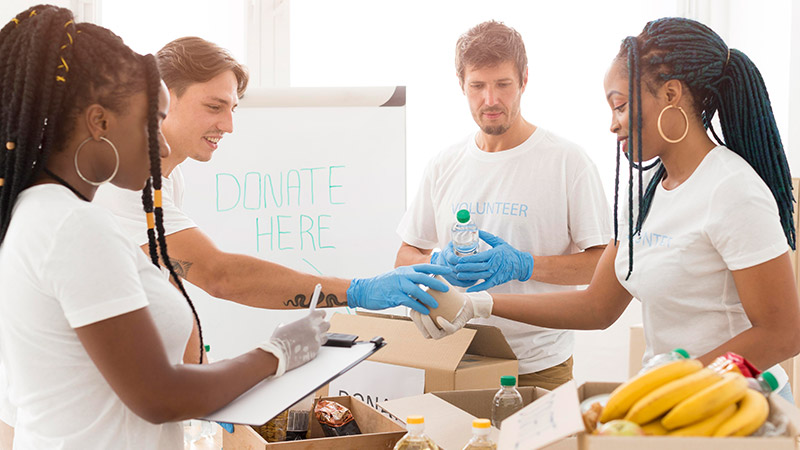Not-for-profit-council Group of diverse people packing food for charity
