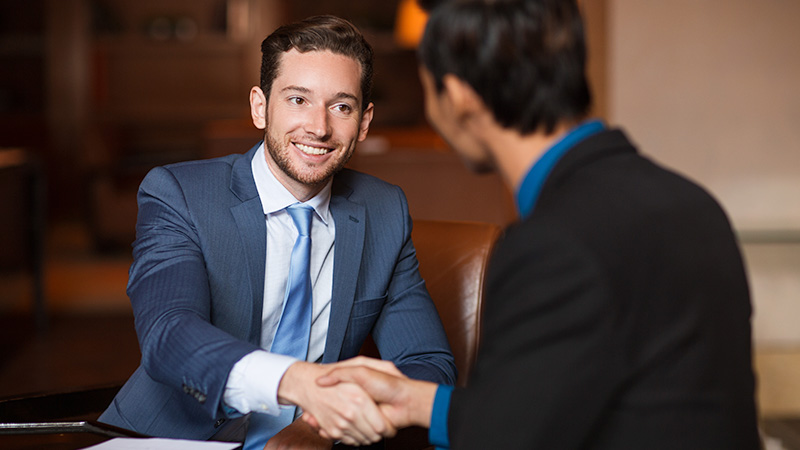 Two men shaking hands